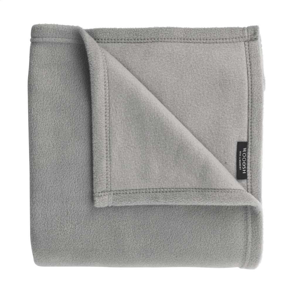 Logo trade ärikingitused foto: Wooosh Vida GRS taaskasutatud materjalist pleed